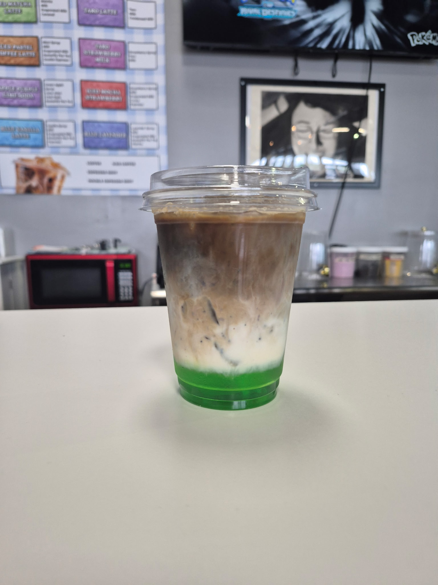 A layered Kiki's specialty drink